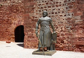 Fototapeta na wymiar Statue of Sancho I outside the castle, Silves, Portugal, Europe.
