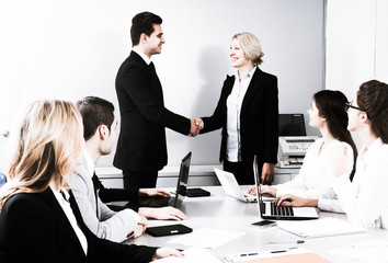 Business handshake at negotiations