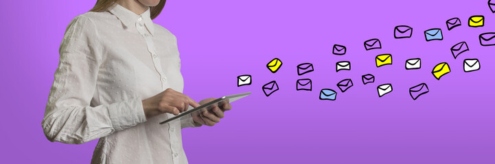Email sign and young woman with a tablet in hands on a purple background