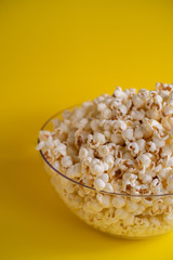 Popcorn in a bowl, space for text