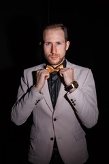 Young man on a black background