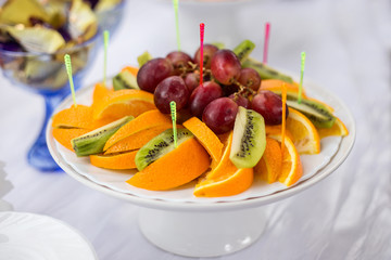 a decorated table for the wedding ceremony. fruit dish
