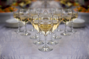 a decorated table for the wedding ceremony. glasses with champagne