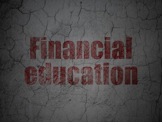 Education concept: Red Financial Education on grunge textured concrete wall background