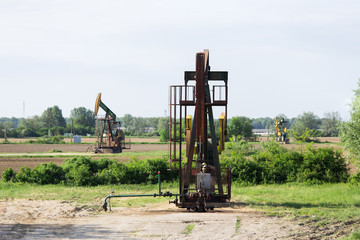 Fototapeta na wymiar Oil rigs work in the field