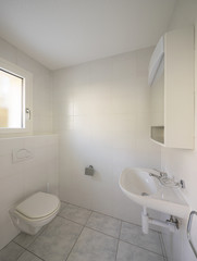Fototapeta na wymiar Bathroom with large tiles, retro style