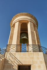 World War II Siege Bell War Memorial from lower viewpoint in the Lower Barrakka Gardens, Valletta, Malta