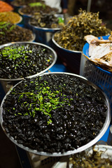 Cambodian night street food market with grilled  black beetle