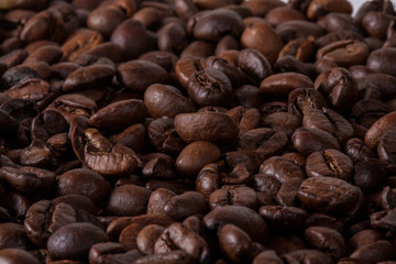 Coffee cup and beans on old kitchen table. Top view with copyspa