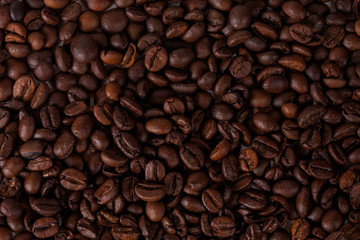 Coffee cup and beans on old kitchen table. Top view with copyspa