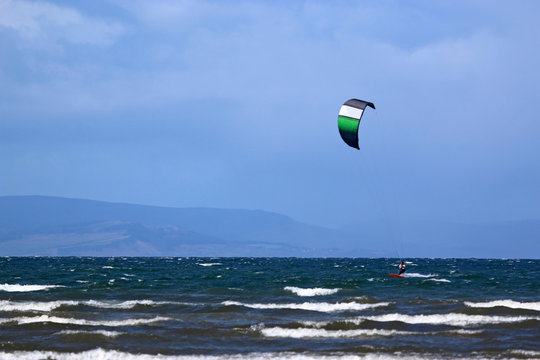 Kitesurfer riding off Barassie beach, Troon