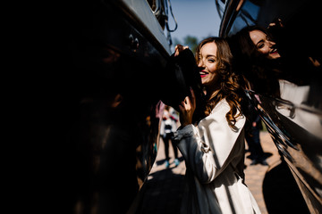 Beautiful young women with red lips in the white dress