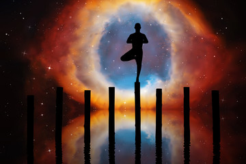 Yoga at night. Vector illustration with silhouette of yogi standing on log. Abstract background with Helix Nebula
