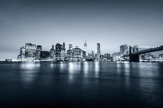 Fototapeta New York City at night. Blue grey tones Manhattan skyline. USA.