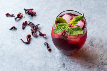 Cold Brew Hibiscus Tea with ice and Mint Leaves.