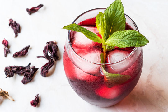 Cold Brew Hibiscus Tea With Ice And Mint Leaves.