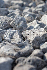 Stone crushed stone on the construction site as an abstract background