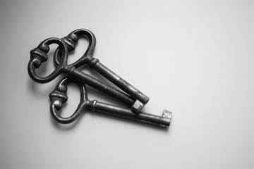 three old vintage key on white background. Antique rusty keys on white background