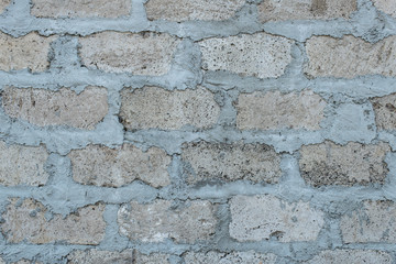 Grunge dirty old brick stone wall.