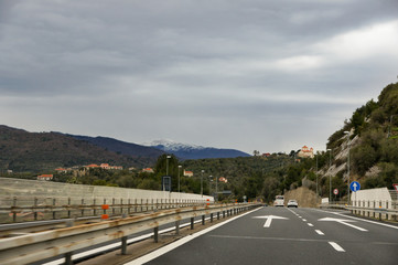 Gray clouds over the highway.