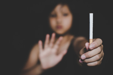 Girls Refusing cigarettes. STOP Smoking. World no tobacco day concept.