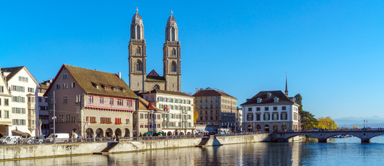 Embankment of river Limmat with Fraumunster and Grossmunster, Zurich, Switzerland