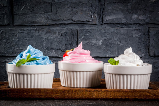 Healthy Diet Summer Dessert, Vanilla And Berry Frozen Yogurt Or  Soft Ice Cream In White Bowls, White Marble Background Copy Space Above