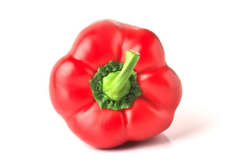 Single whole red Bell pepper isolated on white background.