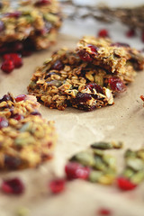 Healthy and nutritional candy bar, oatmeal, dried fruit, etc are on paper