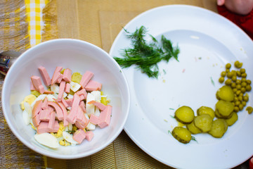 process of preparation of salad by the child at school of young cooks