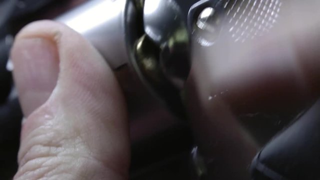 Revolver Gun, Loading Revolver Gun with Bullets, Extreme Close-Up, Macro