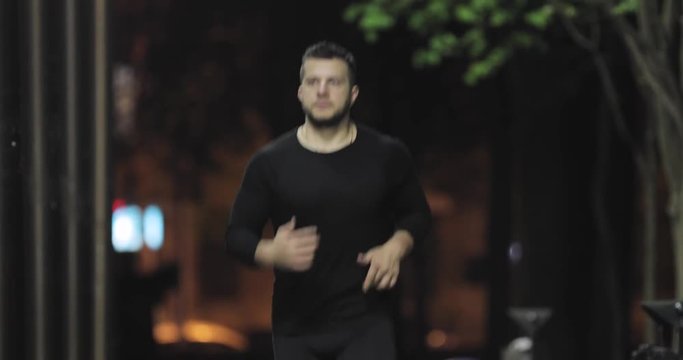Man running at night city
