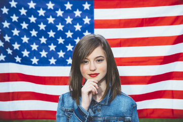 Happy teen girl with flag