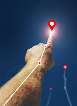 The man's hand. The finger points upwards. Striving for success and achieving the goal