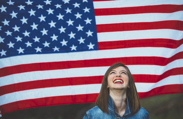 Happy teen girl with flag