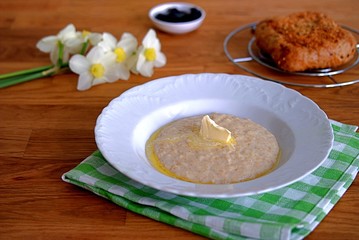 Sweet oatmeal with butter for breakfast