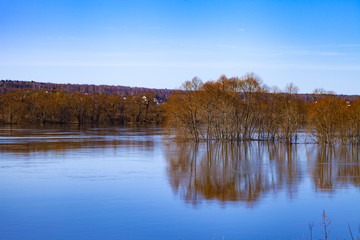 Beautiful spring landscape with a spilled river