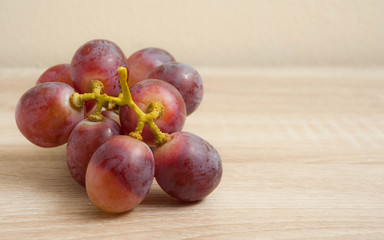 Fresh grape  on wooden table,selective focus