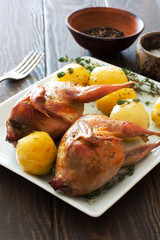 Roasted quails and potatoes