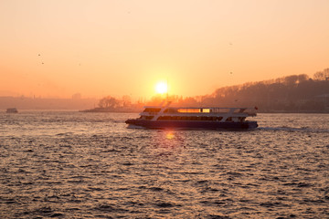 Tourist and public boat at sunset. The Sea of Marmara. Istanbul, Turkey