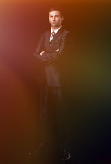 Fototapeta premium portrait of confident businessman,isolated on a black