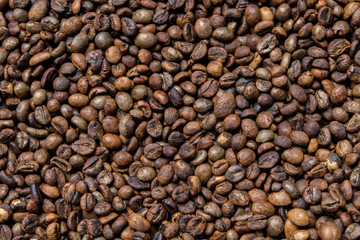 Fototapeta premium Bake coffee beans in a traditional way pan