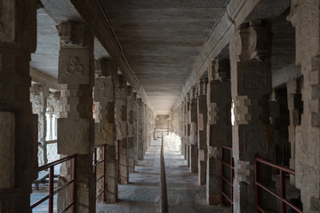 Fototapeta na wymiar Corridor in the ancient complex of Virupaksha temple.