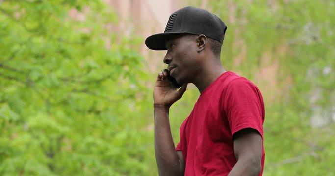 African america man calling and waiting, abonent is not answer