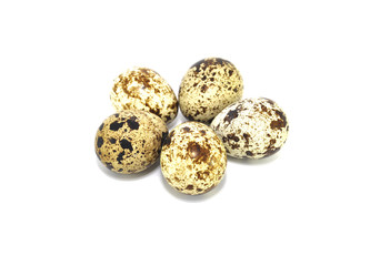 Quail eggs on white background closeup