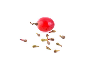 Red grape and seed isolated on the white background.