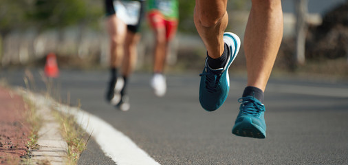 Marathon running in the light of evening,detail of sports shoes
