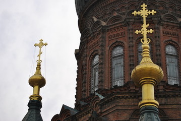 Fototapeta na wymiar Crosses on a Russian Orthodox Church Exterior in Harbin, China