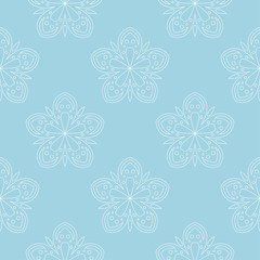 White floral seamless pattern on blue background