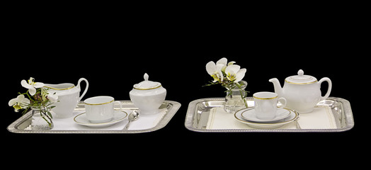 Tea trays isolated in black